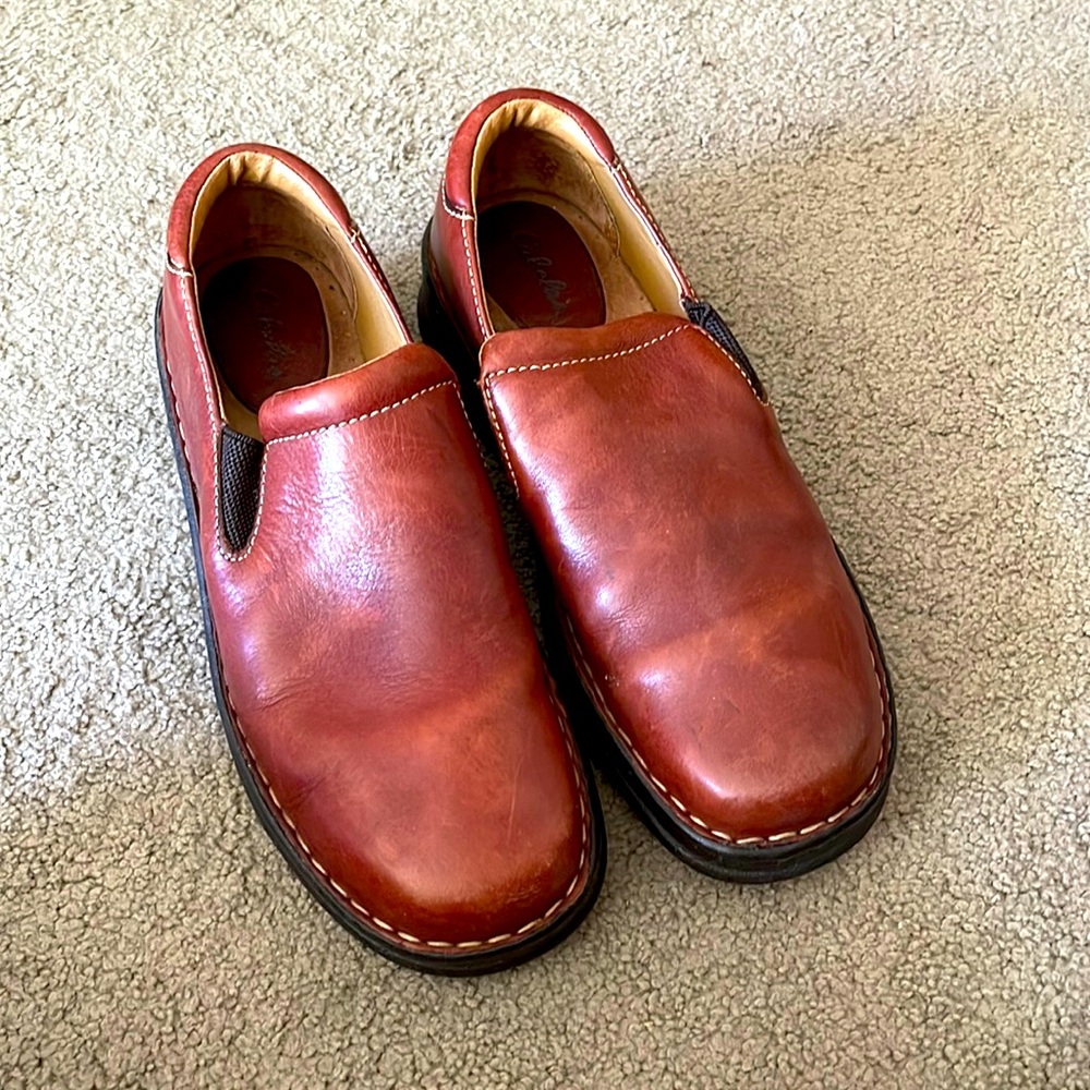 Brown leather slip on shoes